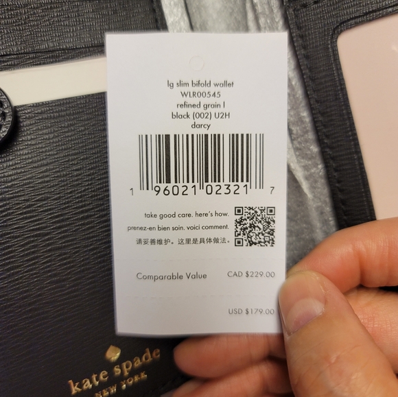 Kate Spade. New York  Large Slim Bifold Wallet. - Picture 4 of 4